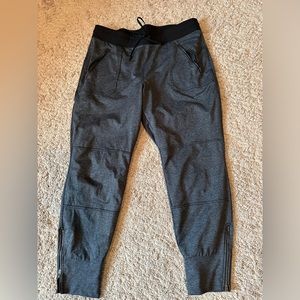 Flecked gray grey Athleta joggers size large. Ankle zipper, drawstring. Like new